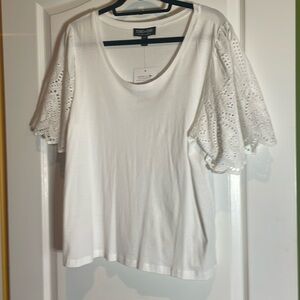White T-shirt with white eyelet sleeves pit to pit 19, length 25 NWT XL😄